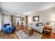 Open-concept living room with hardwood floors and ample seating; perfect for entertaining guests at 245 Main St, Broomfield, CO 80020