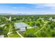 Serene park featuring a tennis court, playground, and walking paths, perfect for outdoor recreation at 245 Main St, Broomfield, CO 80020