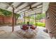 Outdoor patio with ceiling fan, decorative rug, and seating area at 245 Main St, Broomfield, CO 80020