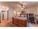 Spacious main bedroom with a view to a bathroom and closet, offering a comfortable space for relaxing and unwinding at 7945 York St # 2, Denver, CO 80229
