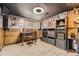 Finished basement featuring vinyl floors, dark trim, a wall mounted TV, and recessed ceiling lighting at 8375 W 17Th W Ave, Lakewood, CO 80214