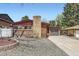 Charming brick home with a spacious driveway and attached garage at 8375 W 17Th W Ave, Lakewood, CO 80214