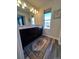 Well lit bathroom features double vanity and granite countertop at 2383 S Troy Ct, Aurora, CO 80014