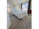 Comfortable bedroom with plush carpeting and large windows for natural light at 2383 S Troy Ct, Aurora, CO 80014