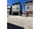 Townhome with attached garages and neutral color scheme at 2383 S Troy Ct, Aurora, CO 80014