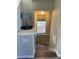 Landing hallway leading to carpeted stairs at 2383 S Troy Ct, Aurora, CO 80014