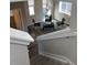Upstairs loft area with natural light, sleek furniture, and modern lighting fixtures at 2383 S Troy Ct, Aurora, CO 80014