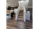 Carpeted staircase that highlights the transition between floors at 2383 S Troy Ct, Aurora, CO 80014