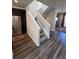 Staircase with carpeted steps and white risers leading up to the second floor at 2383 S Troy Ct, Aurora, CO 80014