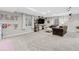 Spacious basement is complete with a cozy seating area and a play area, ideal for entertainment and relaxation at 25148 E Lake Pl, Aurora, CO 80016