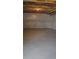 Unfinished basement with insulated walls, concrete floor, and exposed ceiling framework at 394 Grey Rock St, Brighton, CO 80601