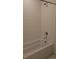 Clean, white bathtub and shower combination with a chrome shower head and fixtures at 394 Grey Rock St, Brighton, CO 80601