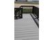 Gray deck with black railings, a perfect place to relax outdoors and enjoy the views at 394 Grey Rock St, Brighton, CO 80601