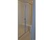 Modern walk-in shower with glass doors and white tiled walls and integrated bench at 394 Grey Rock St, Brighton, CO 80601