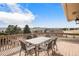 Back deck with beautiful views of the surrounding landscape at 1095 Lake Woodmoor Dr, Monument, CO 80132