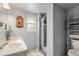 Bathroom featuring a vanity with marble countertop and a walk-in shower at 1095 Lake Woodmoor Dr, Monument, CO 80132