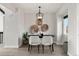 Dining room is complete with modern chandelier and stylish decor at 1640 Amherst Dr, Longmont, CO 80503