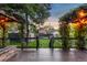 View of backyard from deck, showing a lawn and garden at 2845 N Vine St, Denver, CO 80205