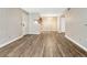 Bright living area with modern flooring and neutral walls, ready for personalization at 8555 Fairmount Dr # G103, Denver, CO 80247