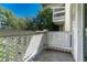A private patio with lattice railing and nice views, perfect for relaxing outdoors at 8555 Fairmount Dr # G103, Denver, CO 80247