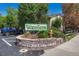 Community entrance sign for Woodside at 8555 Fairmount at 8555 Fairmount Dr # G103, Denver, CO 80247
