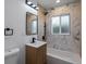 Newly remodeled bathroom with modern fixtures, stylish vanity, and elegant wall tile at 449 King St, Denver, CO 80204