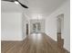 Spacious living room with archways, modern lighting, wood floors, and plenty of natural light at 449 King St, Denver, CO 80204