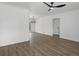 Living room featuring wood flooring, recessed lighting, and entryways to other rooms at 449 King St, Denver, CO 80204