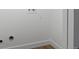 Utility room with light colored walls and updated flooring at 449 King St, Denver, CO 80204