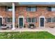 Charming brick townhouse with a cozy front patio at 14034 E Utah Cir, Aurora, CO 80012