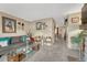 The living room is decorated with modern furniture and cozy decor, with an open view at 14034 E Utah Cir, Aurora, CO 80012