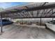 This is a covered parking area with a metal roof and parking for two vehicles at 14034 E Utah Cir, Aurora, CO 80012