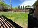 Beautiful backyard featuring a large green lawn, perfect for recreation and outdoor enjoyment at 2991 S Whiting Way, Denver, CO 80231