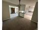 Inviting dining room that connects seamlessly to the living area and kitchen, perfect for entertaining and Gathering meals at 2991 S Whiting Way, Denver, CO 80231