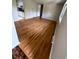 Bright living room features gleaming hardwood floors and fresh neutral paint at 2991 S Whiting Way, Denver, CO 80231