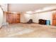 Finished basement with carpet, closet, desk and chair at 7500 E Dartmouth Ave # 16, Denver, CO 80231