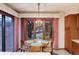 Charming breakfast nook featuring a round table, a window, and lots of natural light at 7500 E Dartmouth Ave # 16, Denver, CO 80231