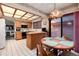 Traditional kitchen with an island, lots of storage, and bright overhead lighting at 7500 E Dartmouth Ave # 16, Denver, CO 80231