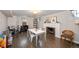Finished basement featuring dark wood floors, a fireplace, and toys at 290 Dexter St, Denver, CO 80220