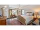 Cozy bedroom with a comfortable bed, natural light, and traditional decor at 290 Dexter St, Denver, CO 80220