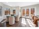 Bright breakfast nook with large windows and glass table, perfect for casual dining at 290 Dexter St, Denver, CO 80220