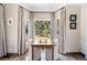 Charming dining area with a bay window and natural light at 290 Dexter St, Denver, CO 80220