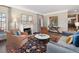 Inviting living room featuring fireplace, comfortable seating, and elegant decor at 290 Dexter St, Denver, CO 80220