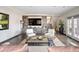 Stylish living area features custom built-ins and ample seating at 290 Dexter St, Denver, CO 80220