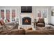 Cozy living room features a fireplace, TV, and comfortable seating with great natural light at 290 Dexter St, Denver, CO 80220