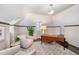 Bright office space featuring a unique ceiling design, hardwood floors and cozy seating at 290 Dexter St, Denver, CO 80220