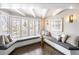 Cozy sitting area featuring a large window seat with bright natural light at 290 Dexter St, Denver, CO 80220