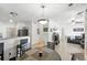 Open-concept living space boasts natural light, eat-in kitchen, and a cozy fireplace at 494 Black Feather Loop # 108, Castle Rock, CO 80104