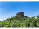 Picturesque natural setting with lush greenery, rocky terrains, and a star installation on top of the mountain at 494 Black Feather Loop # 108, Castle Rock, CO 80104