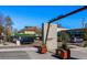 Festival Park with ample parking and shopping featuring beautiful landscaped entrance and distant mountain views at 494 Black Feather Loop # 108, Castle Rock, CO 80104